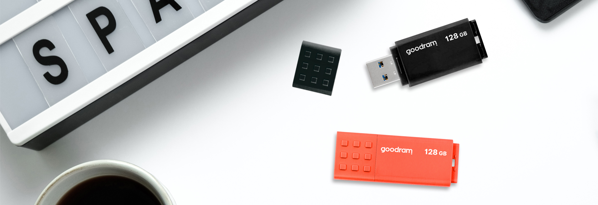 Dwa pendrive'y USB UME w kolorze czarnym i pomarańczowym